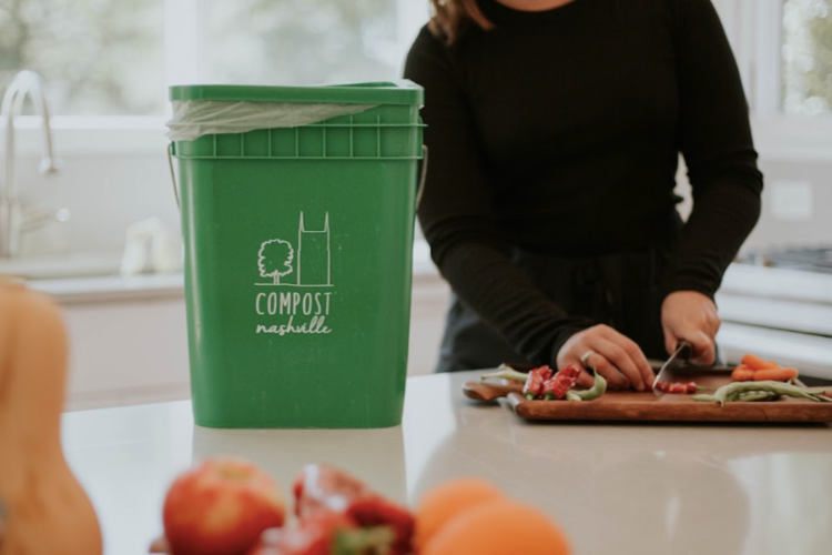 a bin used for apartment composting services that make it clean easy and convenient to compost indoors