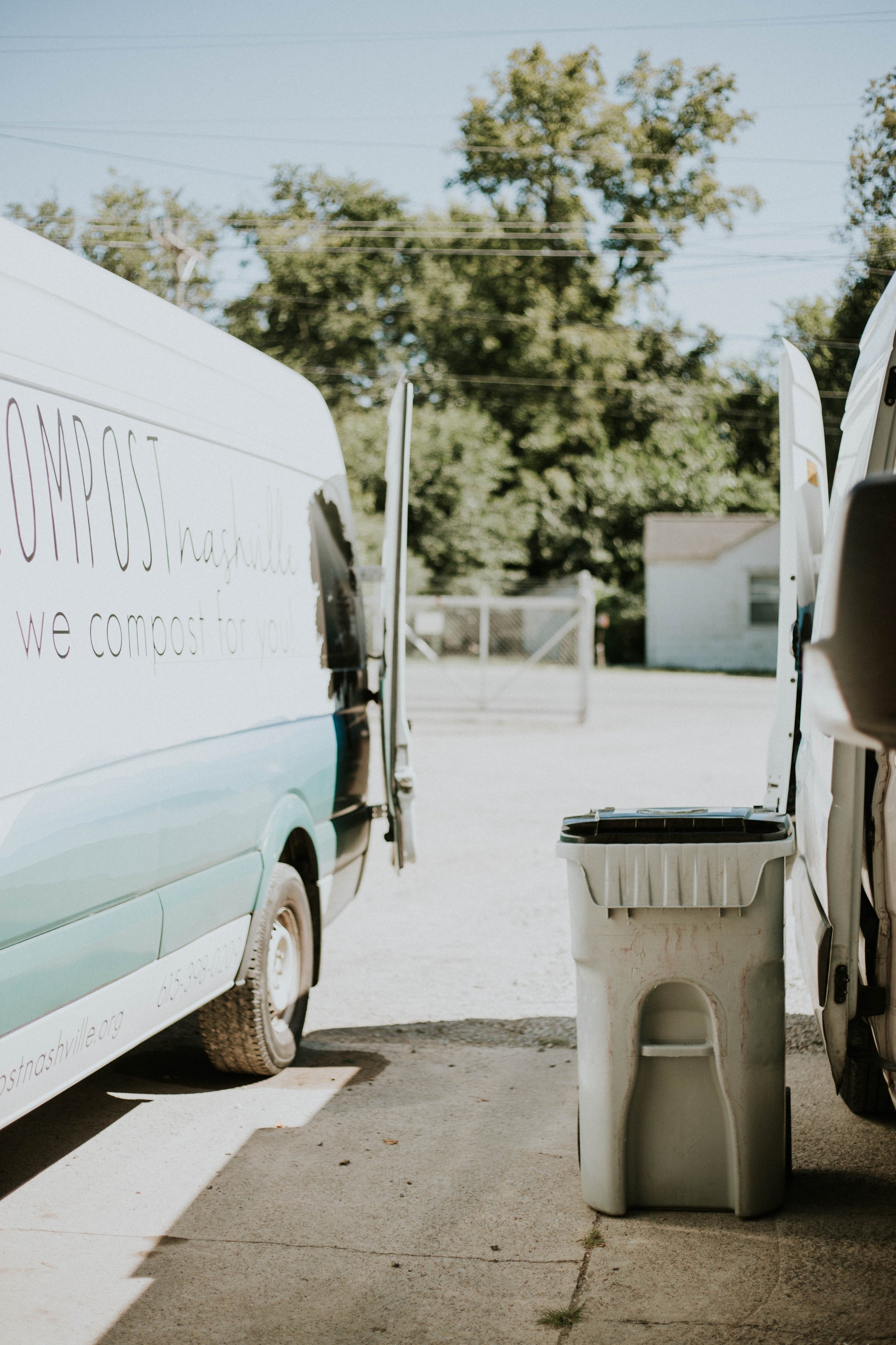 Compost Nashville fleet delivering bins to a business partner